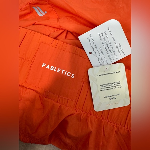 NWT Fabletics High-Waisted Piped Nylon Pant in Passion Orange - Picture 5 of 12